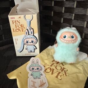 Authentic pin for love I . New opened box.
